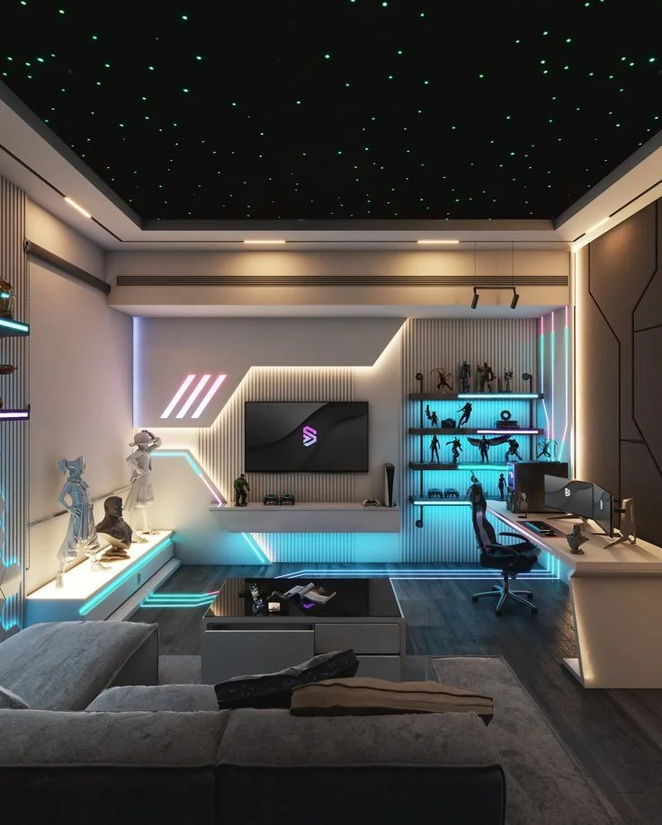 A media room with a star ceiling, a warm cove border, linear profile lights, small spotlights and colour-changing strips around the furniture